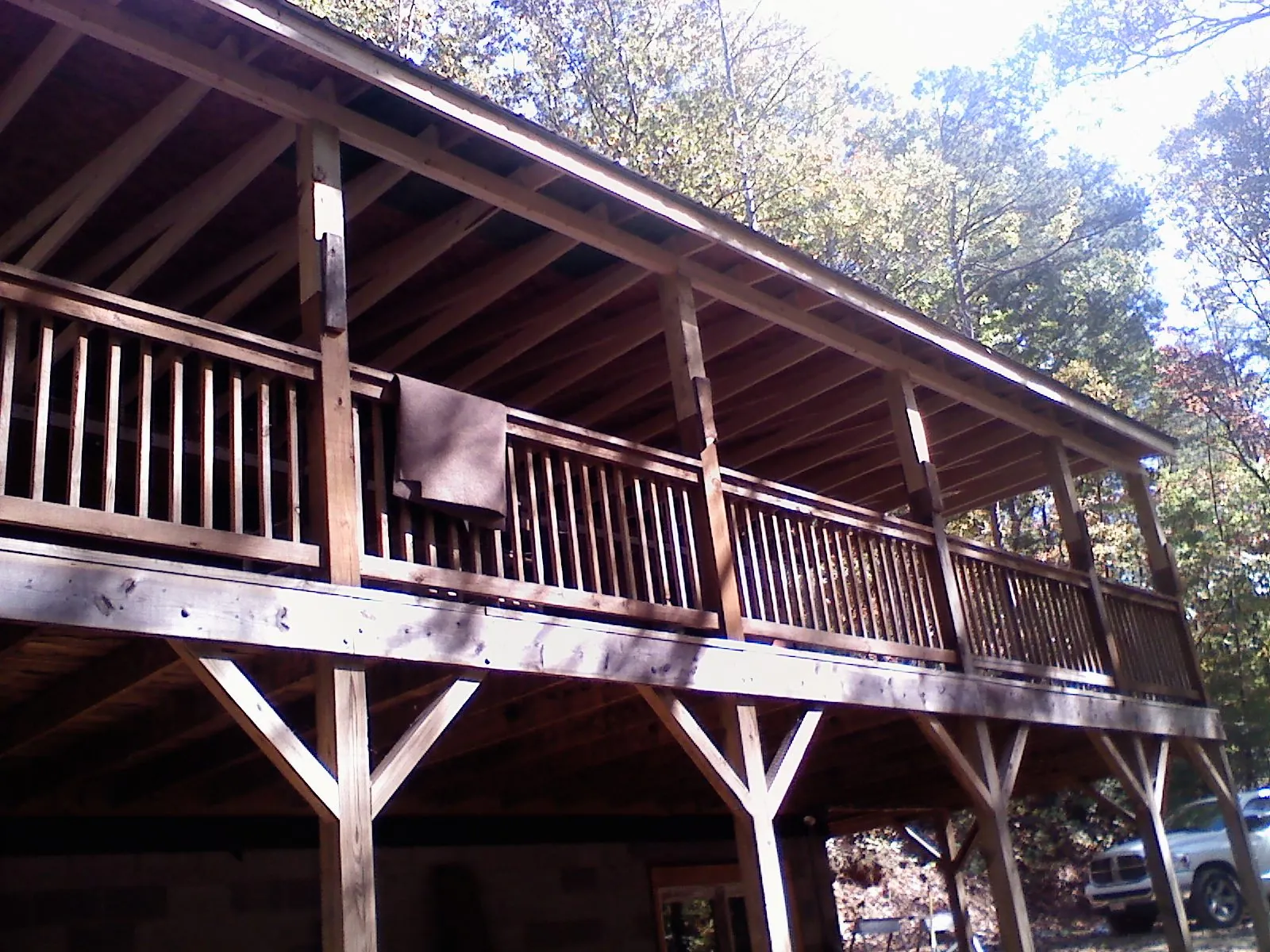Timber framing under a new elevated porch and deck — Roof Leak Repair in Mooreland by Roofing Brothers